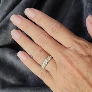 10k yellow gold and variated white diamond band. Size 7.